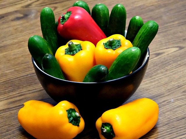 An example of low calorie dense foods are these bell peppers and cucumbers.